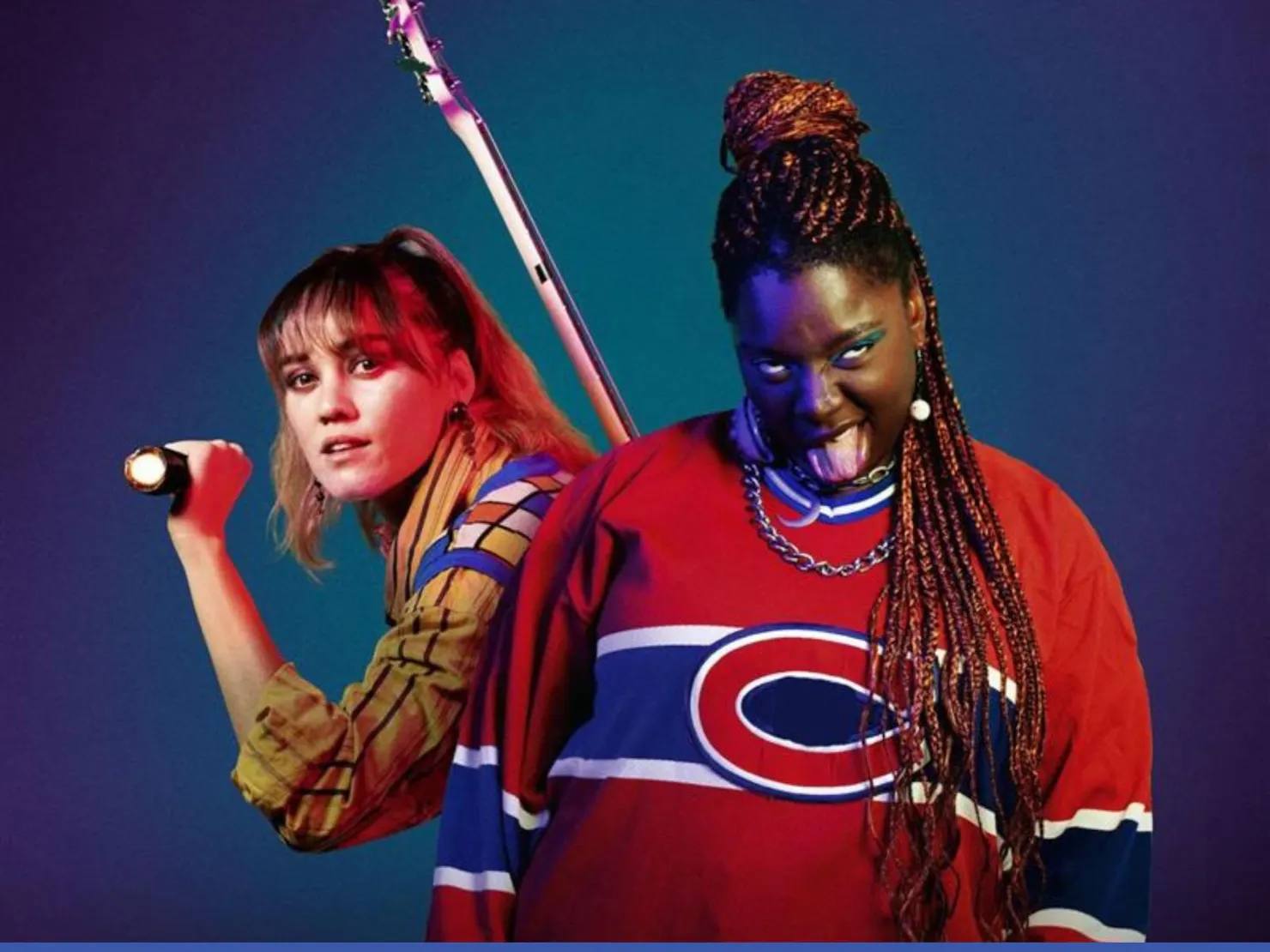 2 teenage girls one in front is dark skinned with dreadlocks in a oversize jersey  blonde girl behin