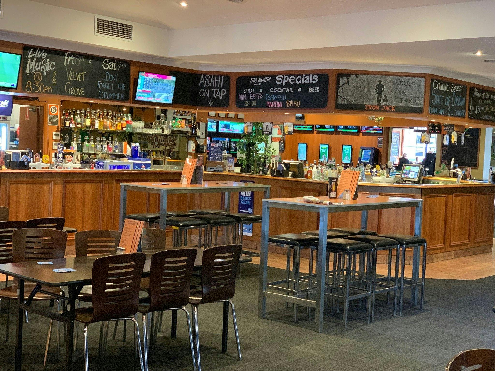 Bar area showing dining tables. No people in photo