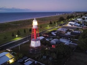 Cape Jaffa Lighthouse - dusk highlighting the lighthouse and Kingston foreshore.