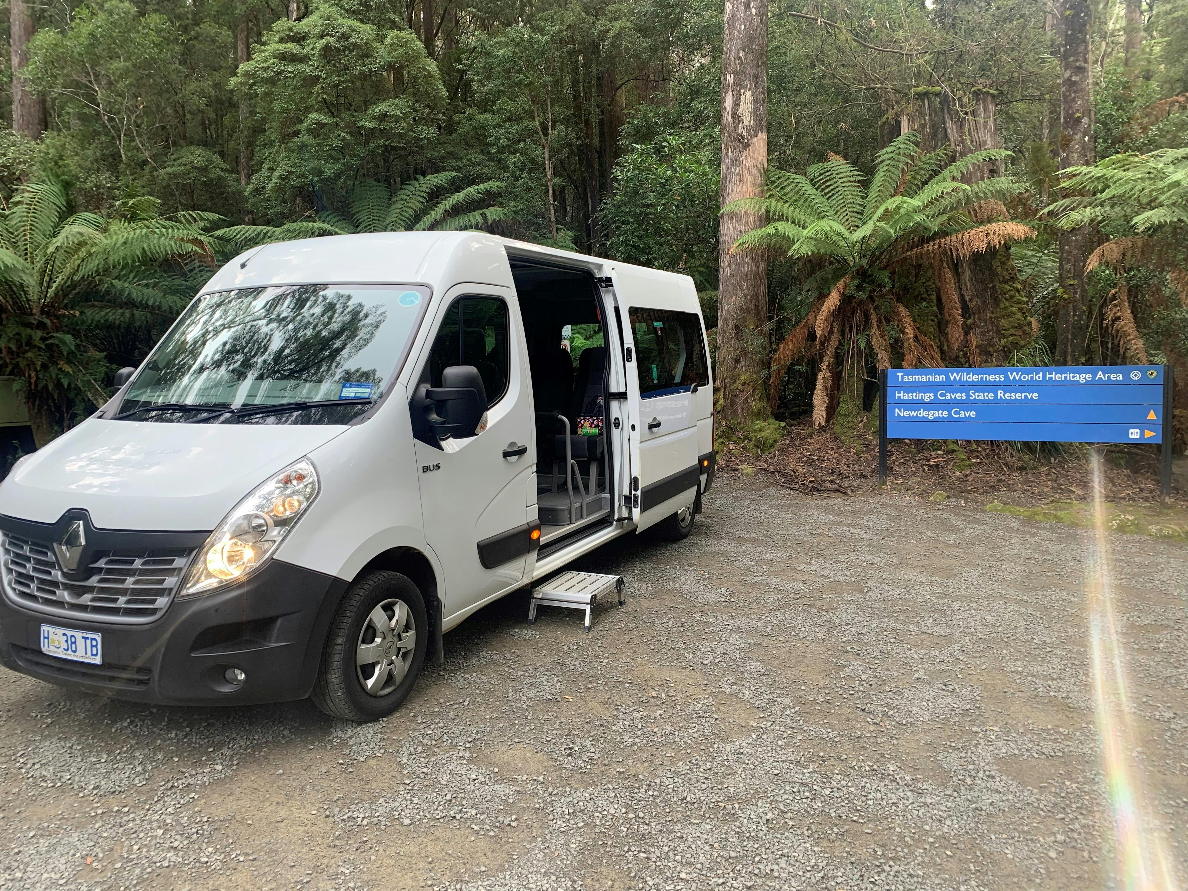 Tour vehicle dropping guests off in the forest