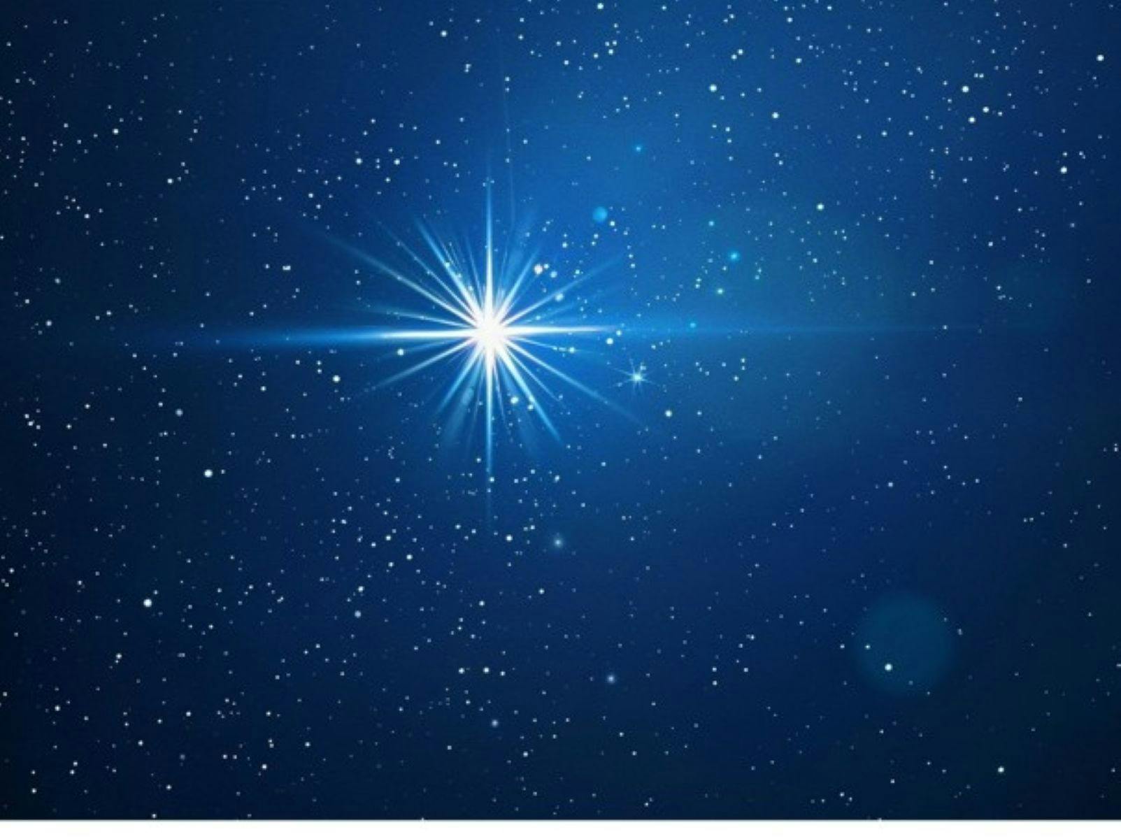 Dark night sky lit up by star
