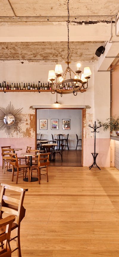 Room with tables and chairs and natural light from sun