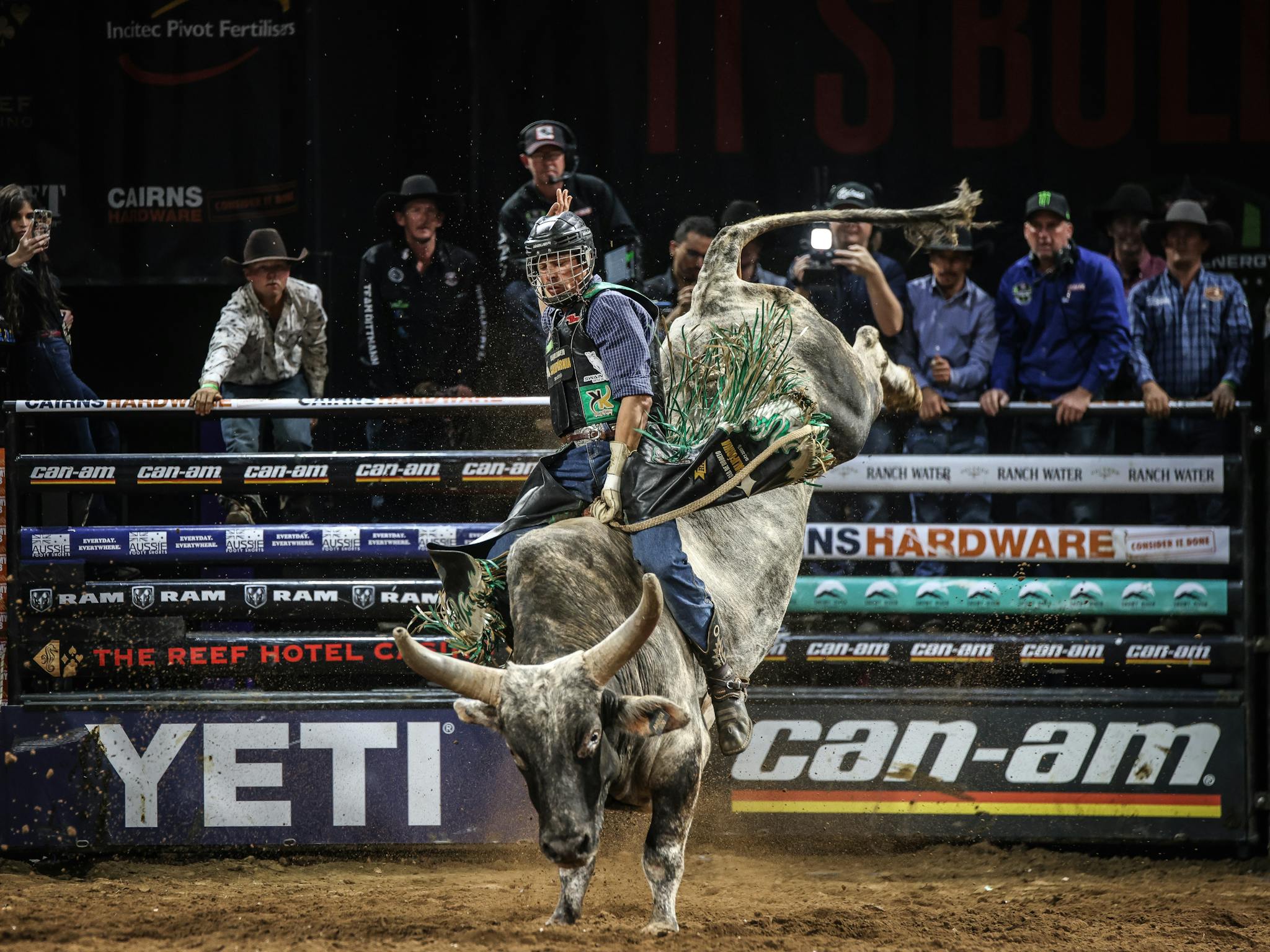 PBR athlete riding bull PBR athlete riding bull