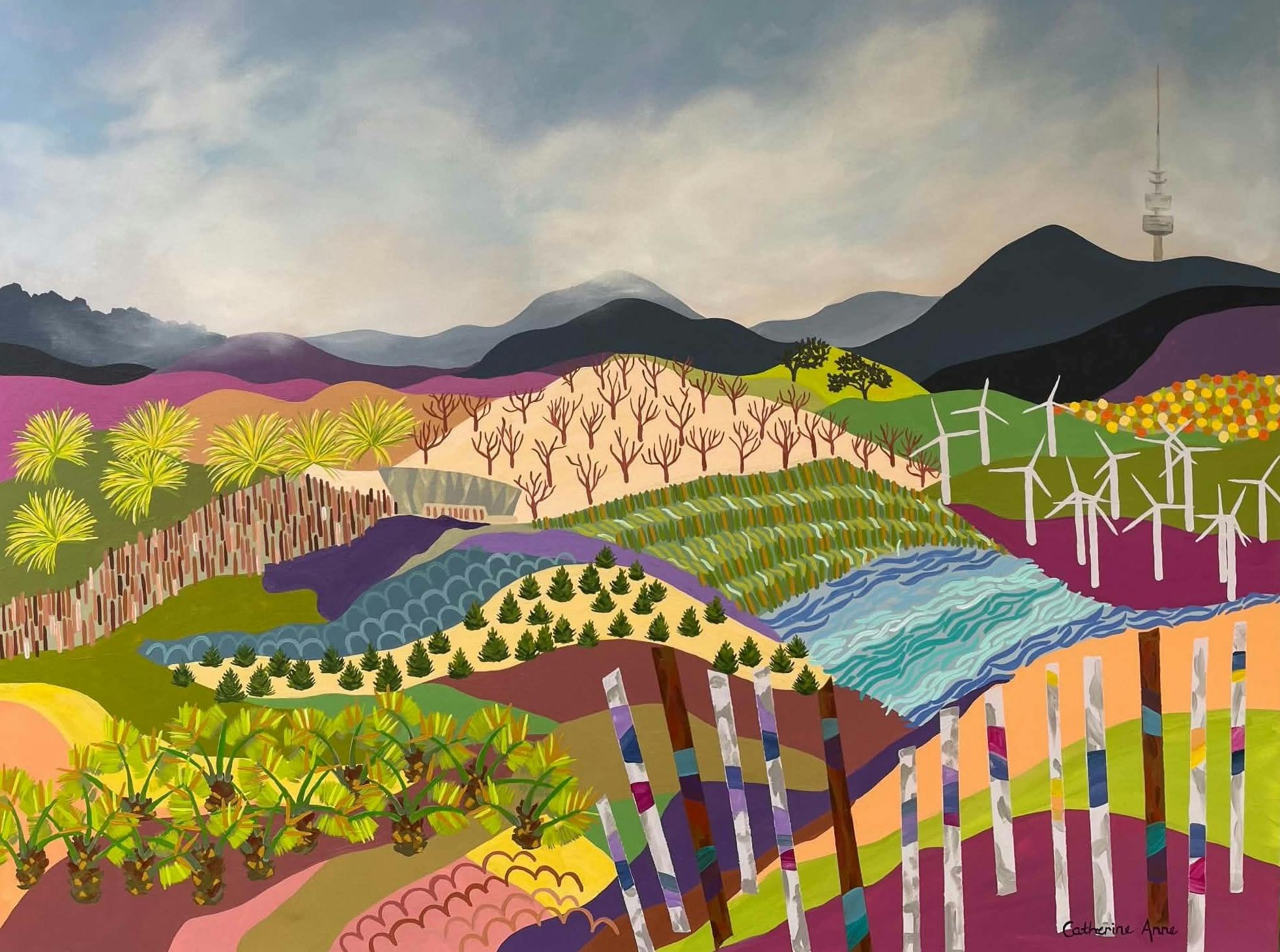 Brightly coloured landscape with geometrically patterned mountains and telstra tower in the backgrou