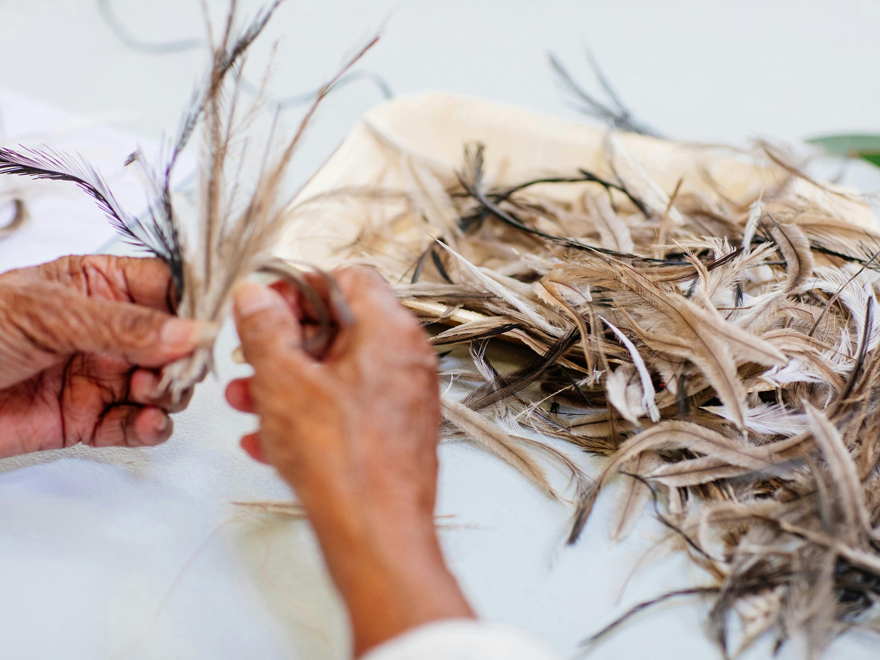 Edith Loo handmaking traditional emu feather ornaments