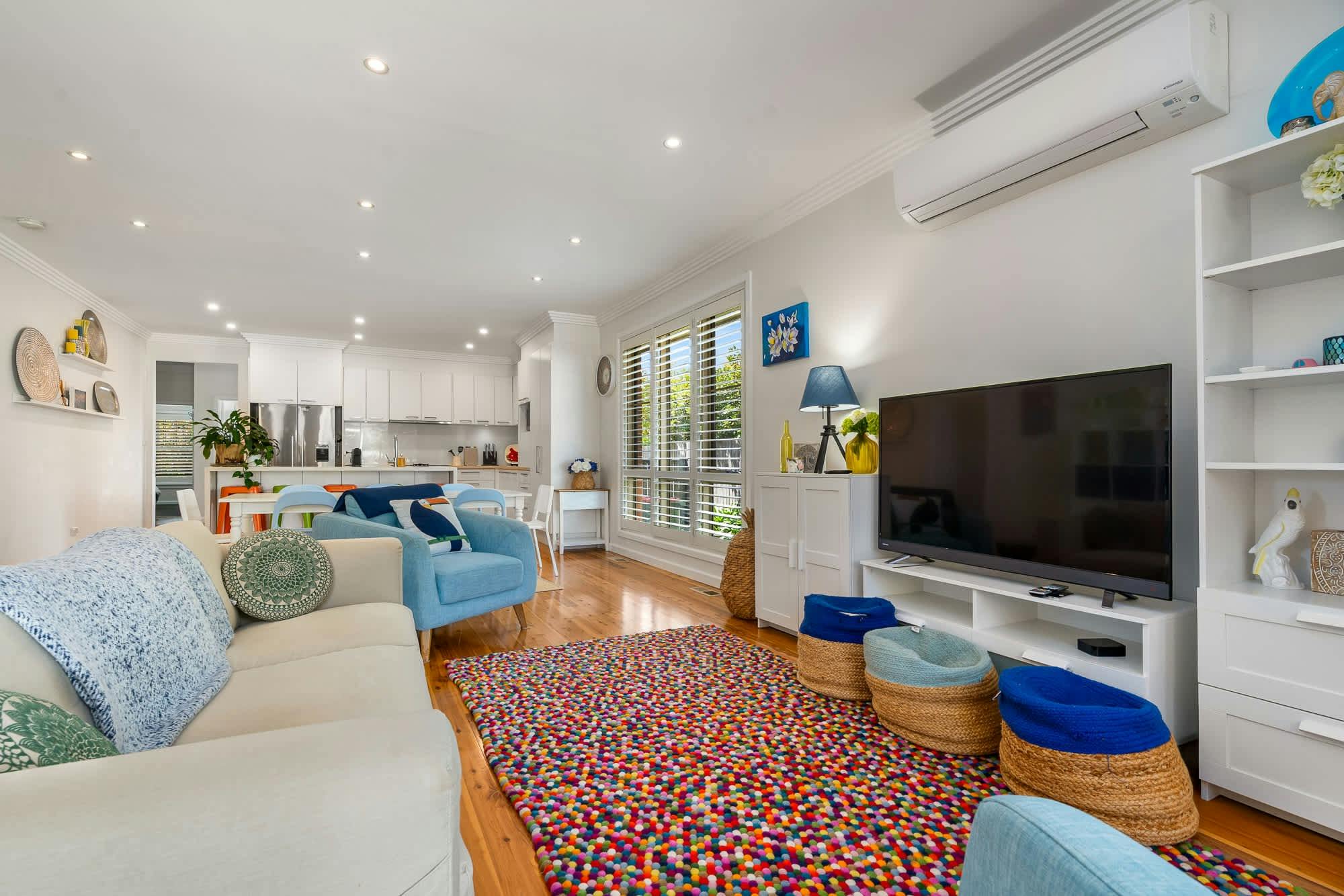 Open living room, dining room and kitchen area, large kitchen.