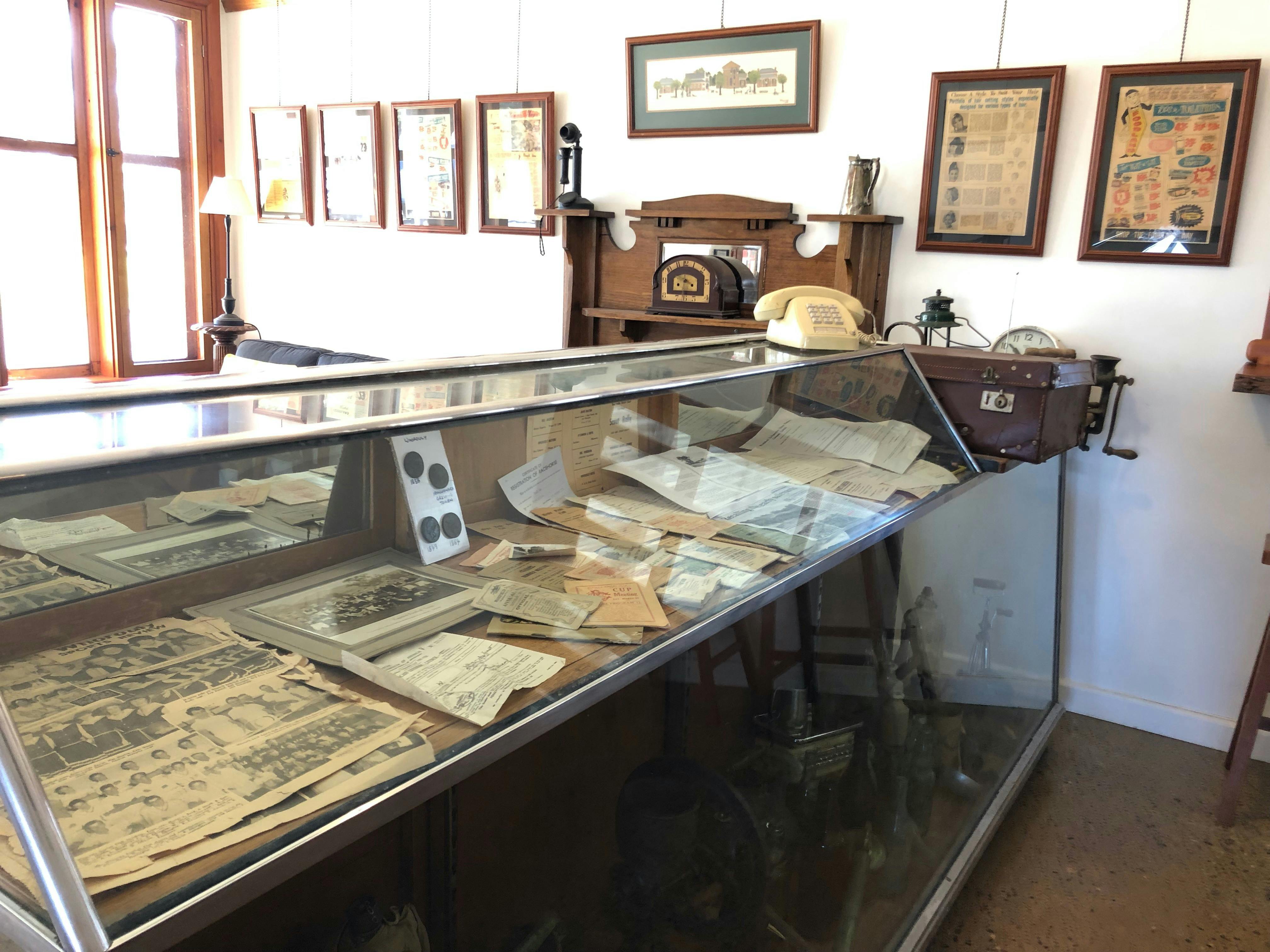 An old display cabinet with historical items.