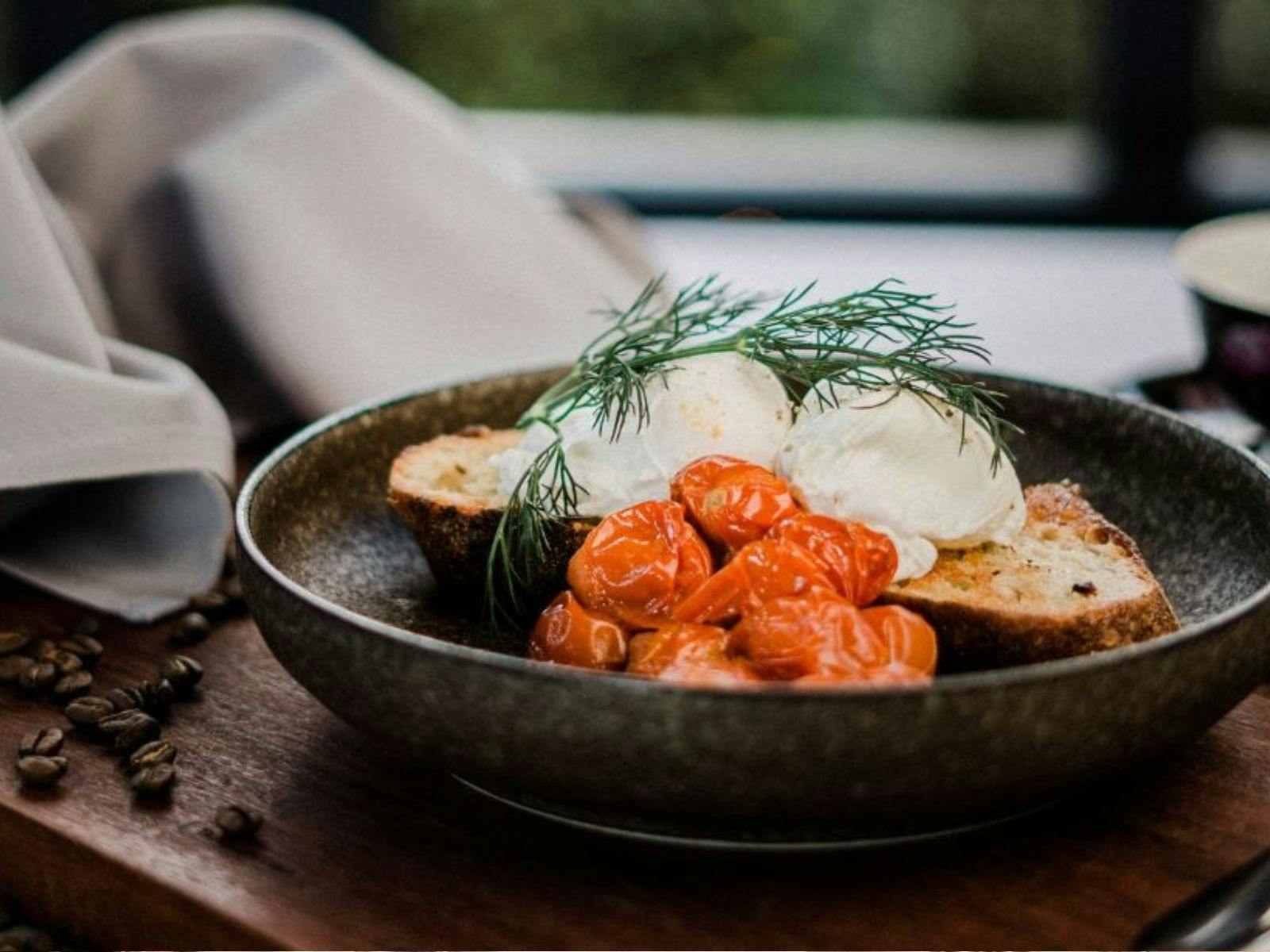 Bacon, eggs and tomato in a bowl