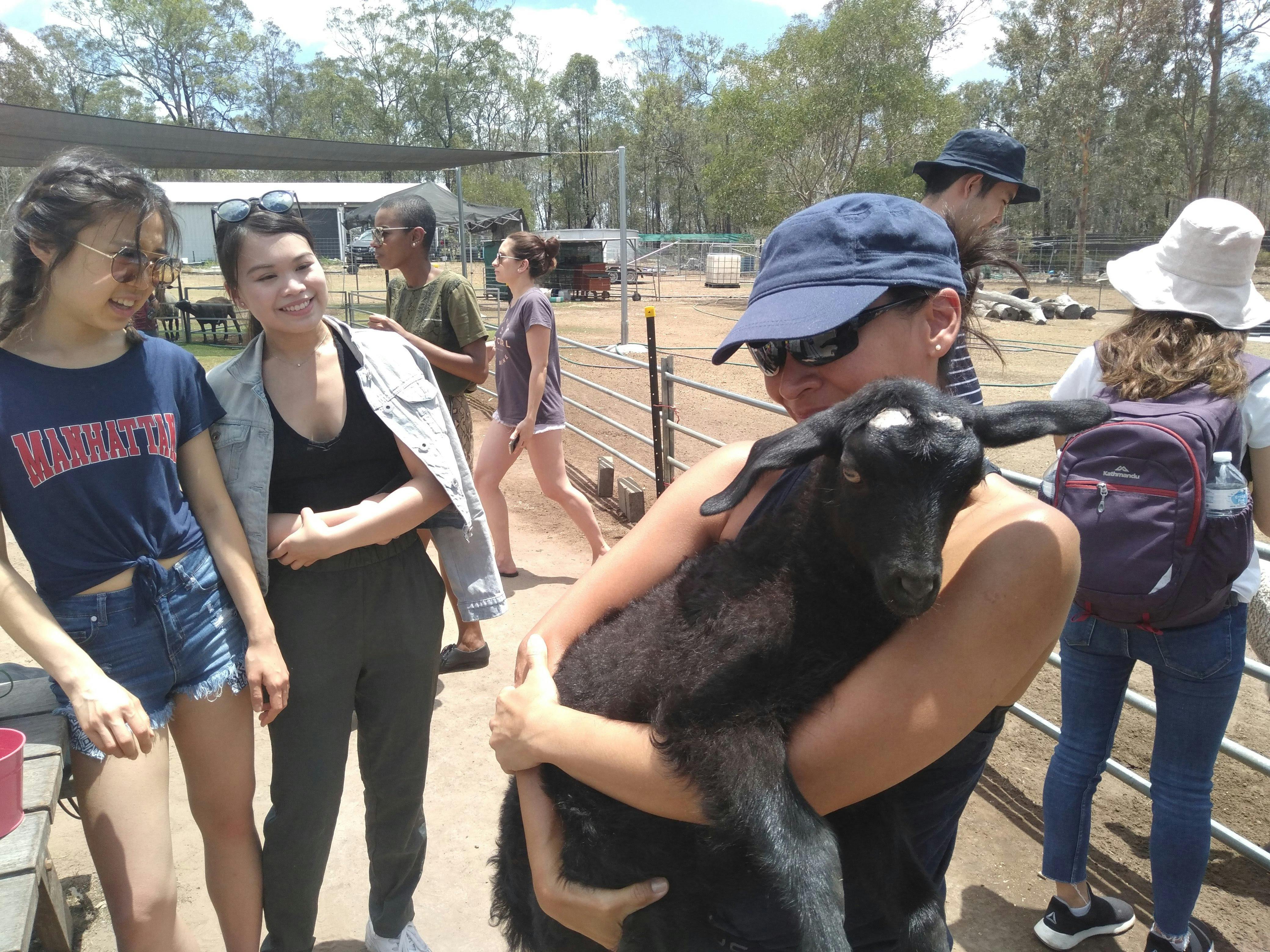 Cuddling a Goat