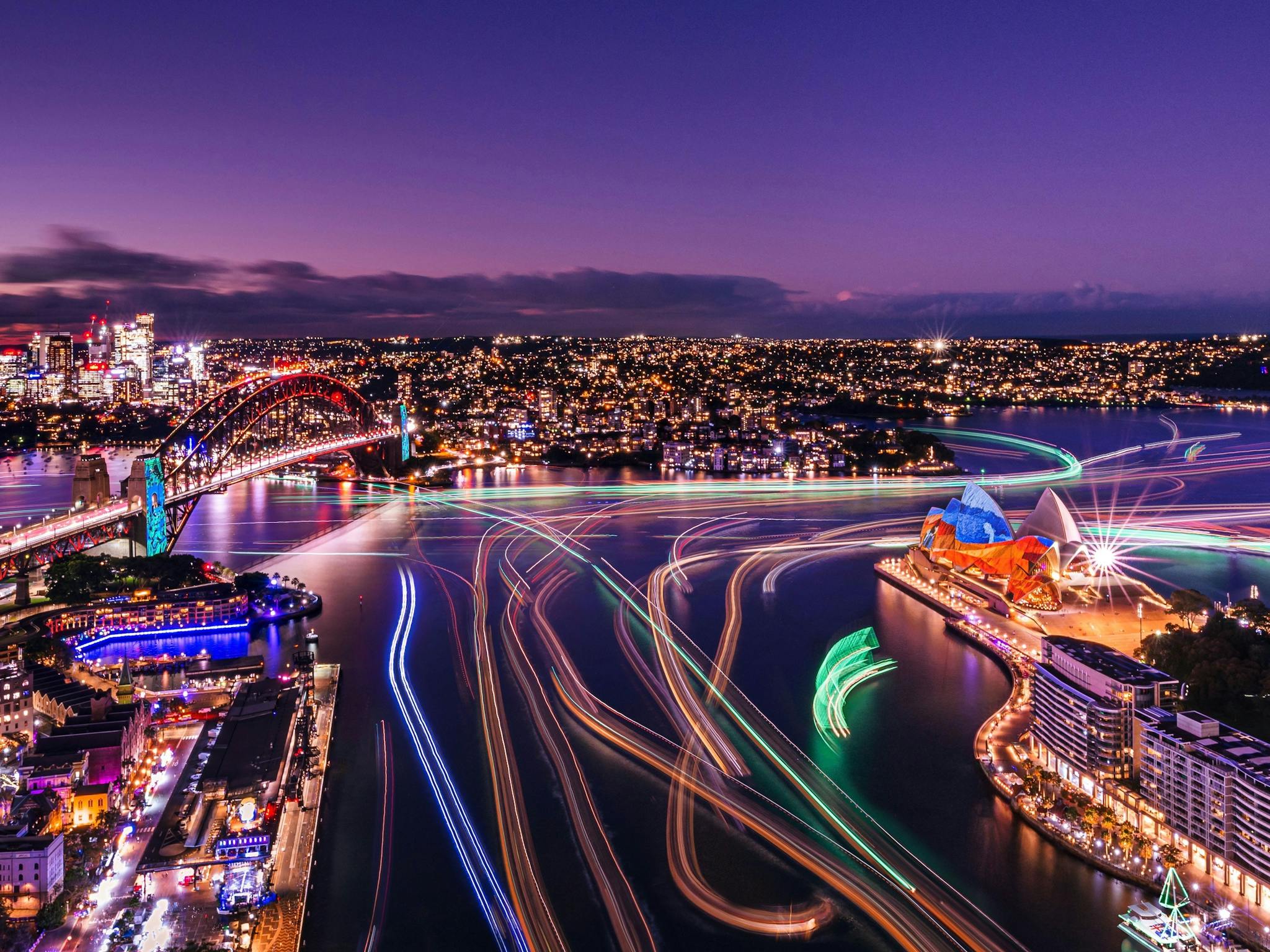 Multiple coloured lights paved across Sydney Harbour Multiple coloured lights paved across Sydney Harbour