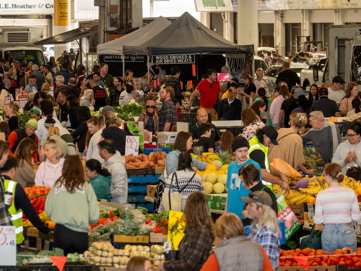 crowds of people browsing the market stalls