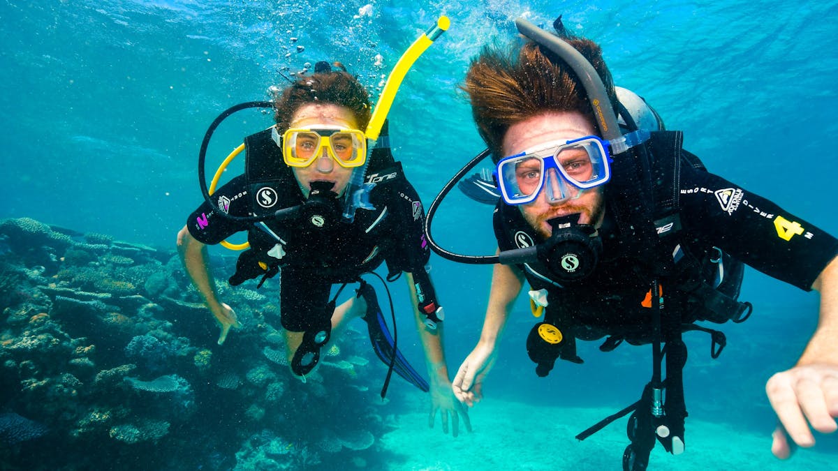 scuba diving on the great barrier reef near port douglas