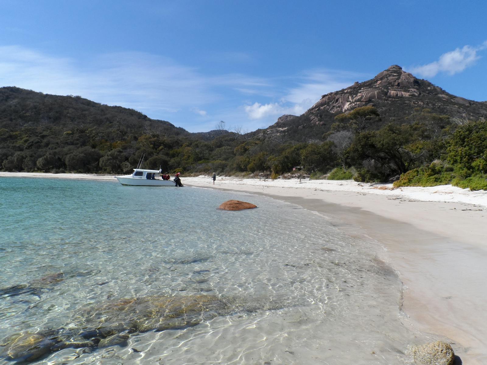 Walkers arrive at Schouten Island. The island is approx 1km off the southern tip of Freycinet .