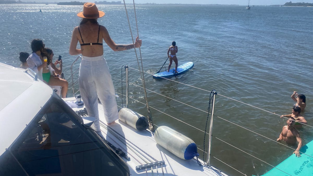 Gold Coast party boat hire padleboarding
