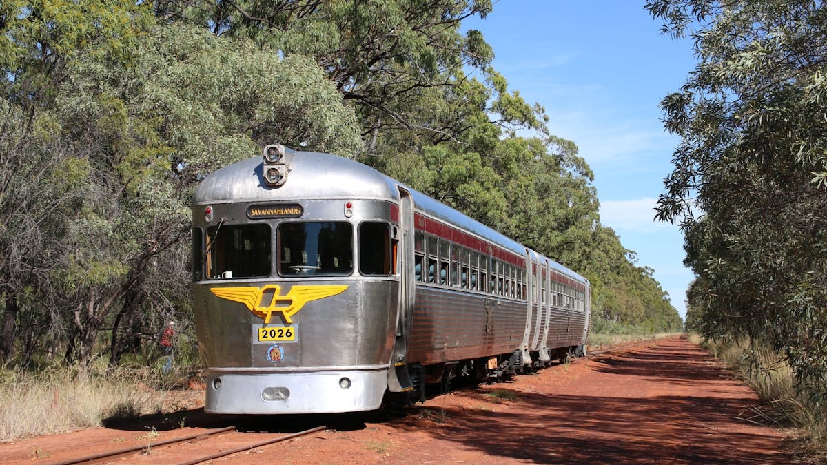 The Savannahlander railmotors stopped on the Newcastle Range in the bush