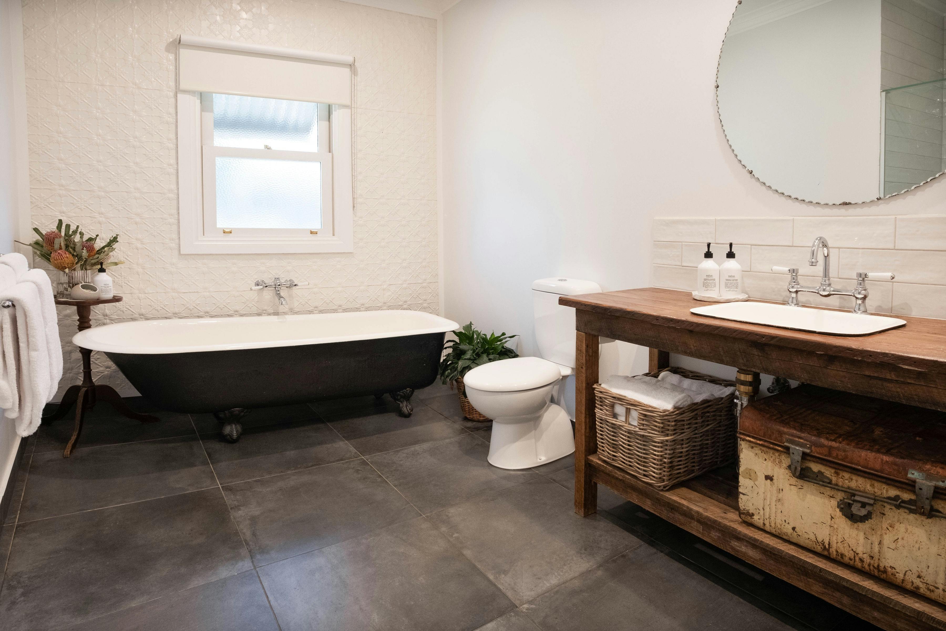 Corner Cottage Bright Bathroom with a bathtub