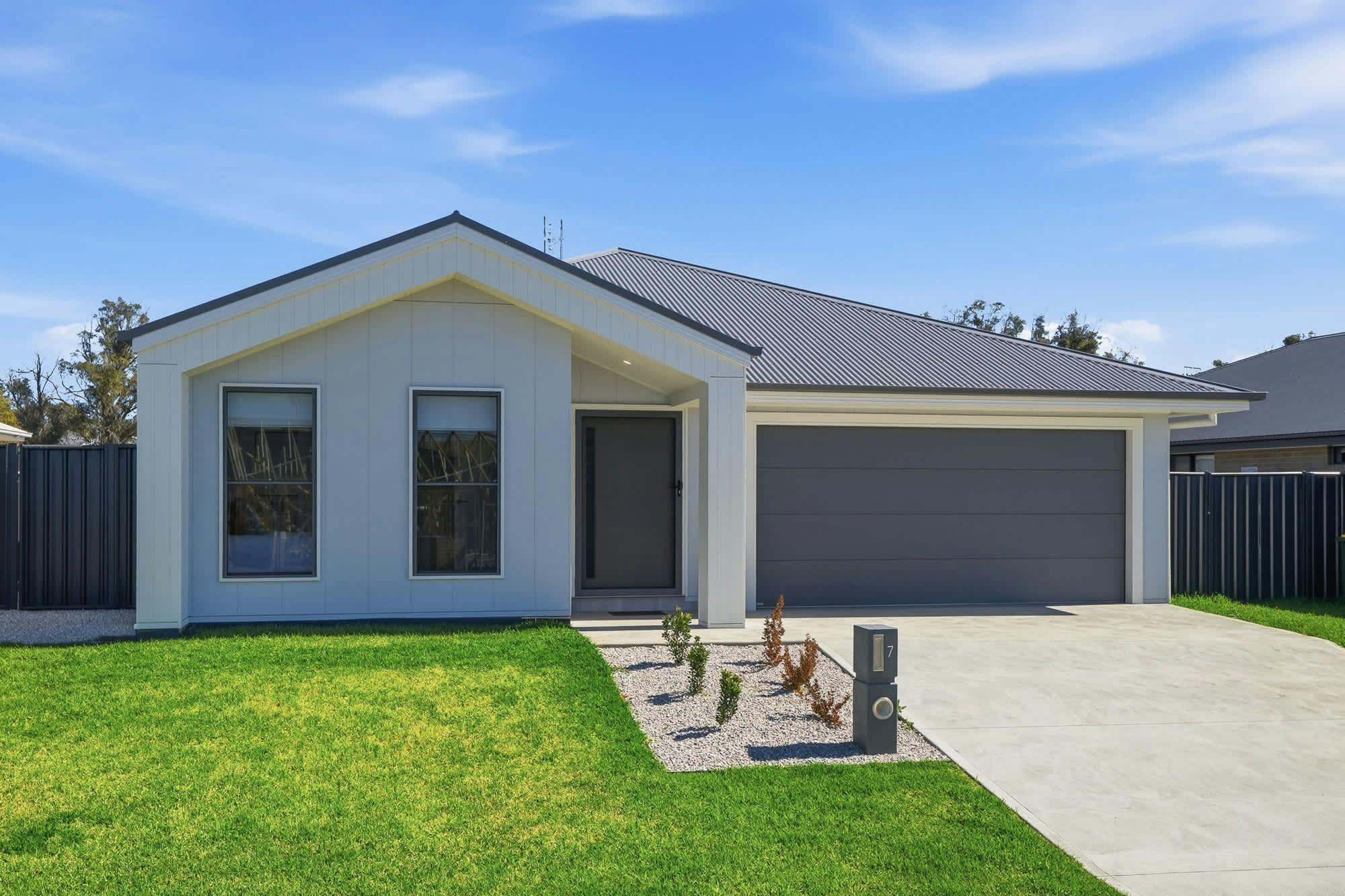 Modern exterior with driveway and garage