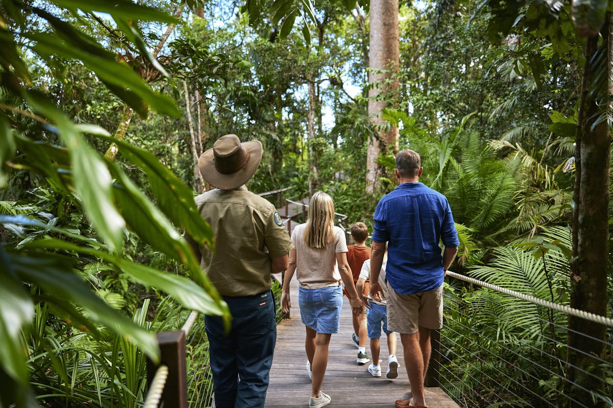 Ranger guided tour at Red Peak Station - family learning the stories of the ancient rainforest