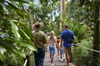 Ranger guided tour at Red Peak Station - family learning the stories of the ancient rainforest