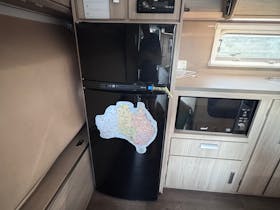 Large caravan fridge/freezer, microwave and cabinets