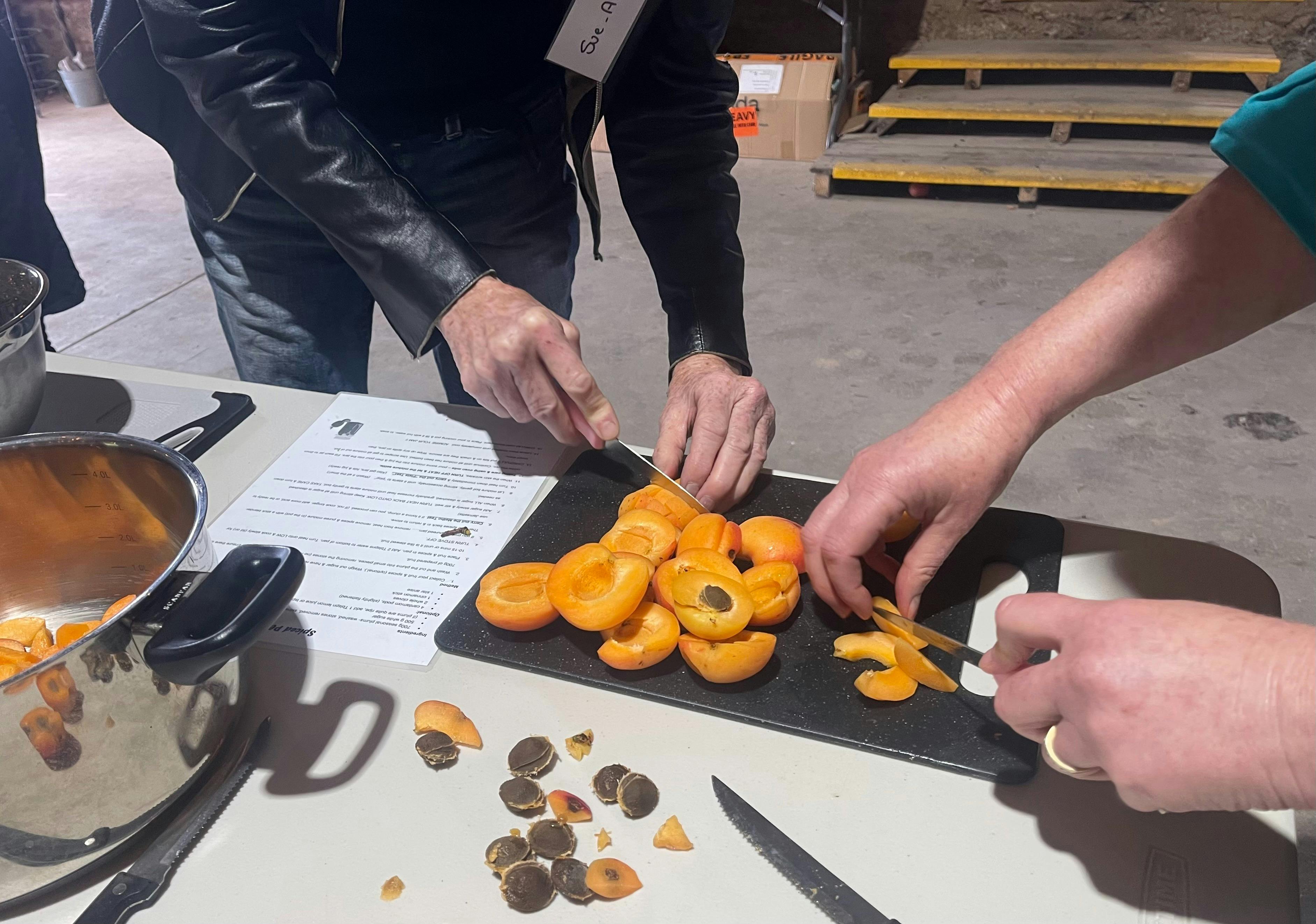 preparing fresh apricots for jam