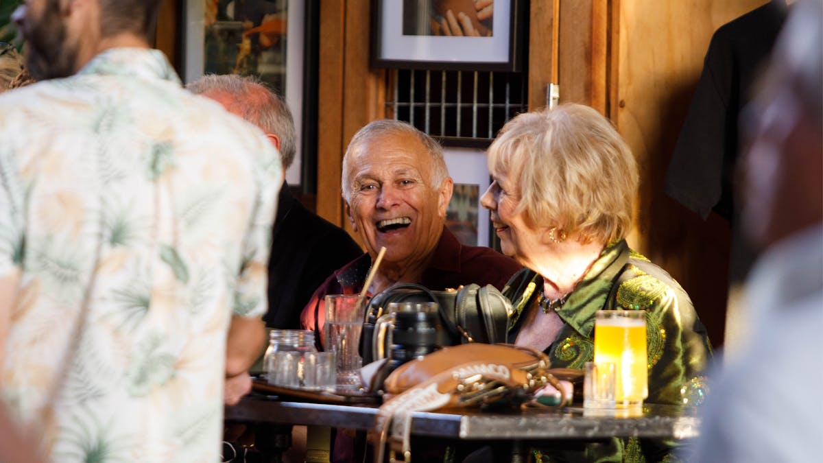 Guests enjoying drinks together at Granddad Jack’s Craft Distillery.