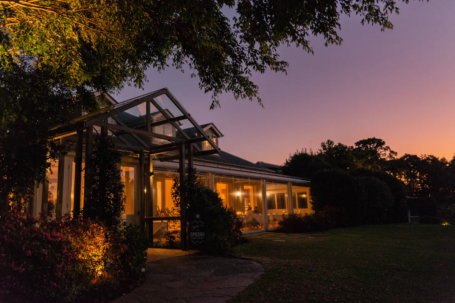 Exterior of Spicers Clovelly Estate at night