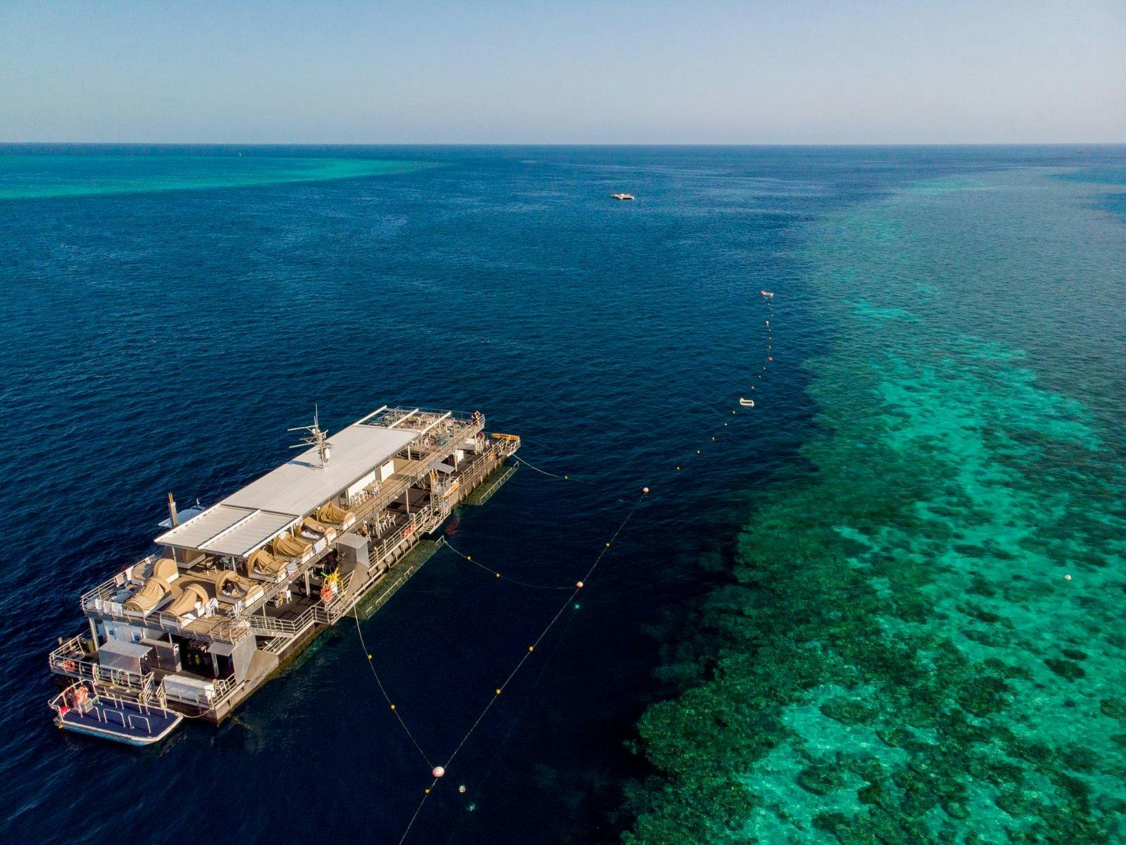 Aerial view of the Reefworld pontoon and Great Barrier Reef