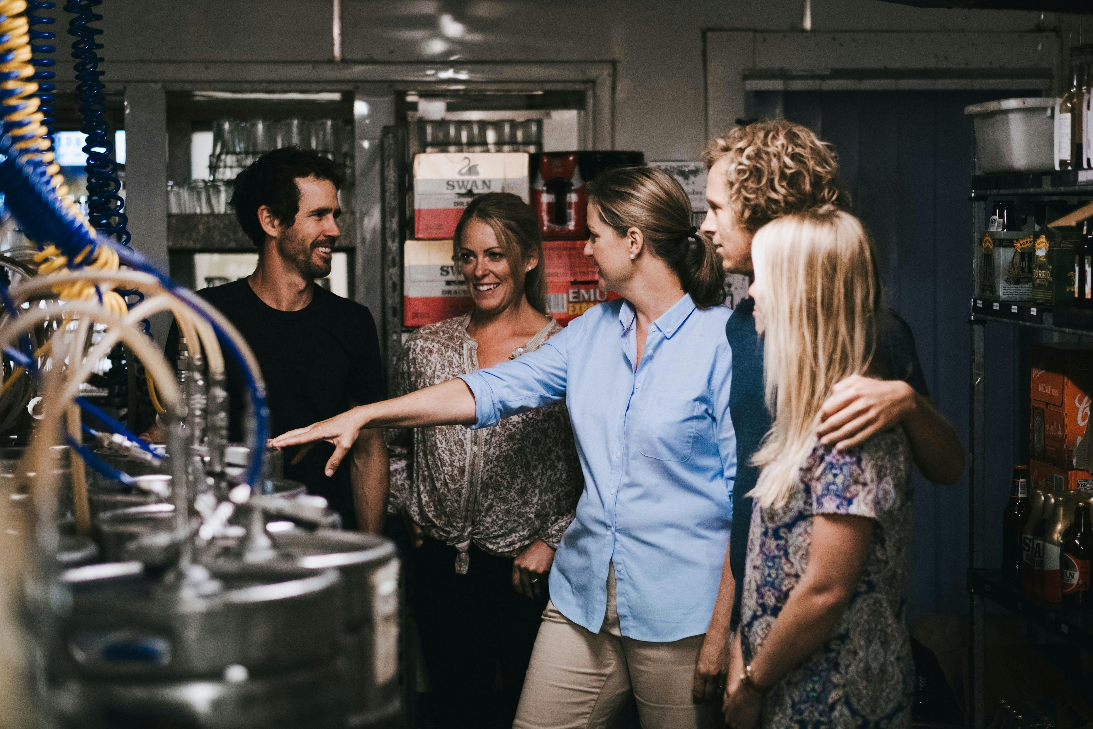 Host shares stories with guests on tour