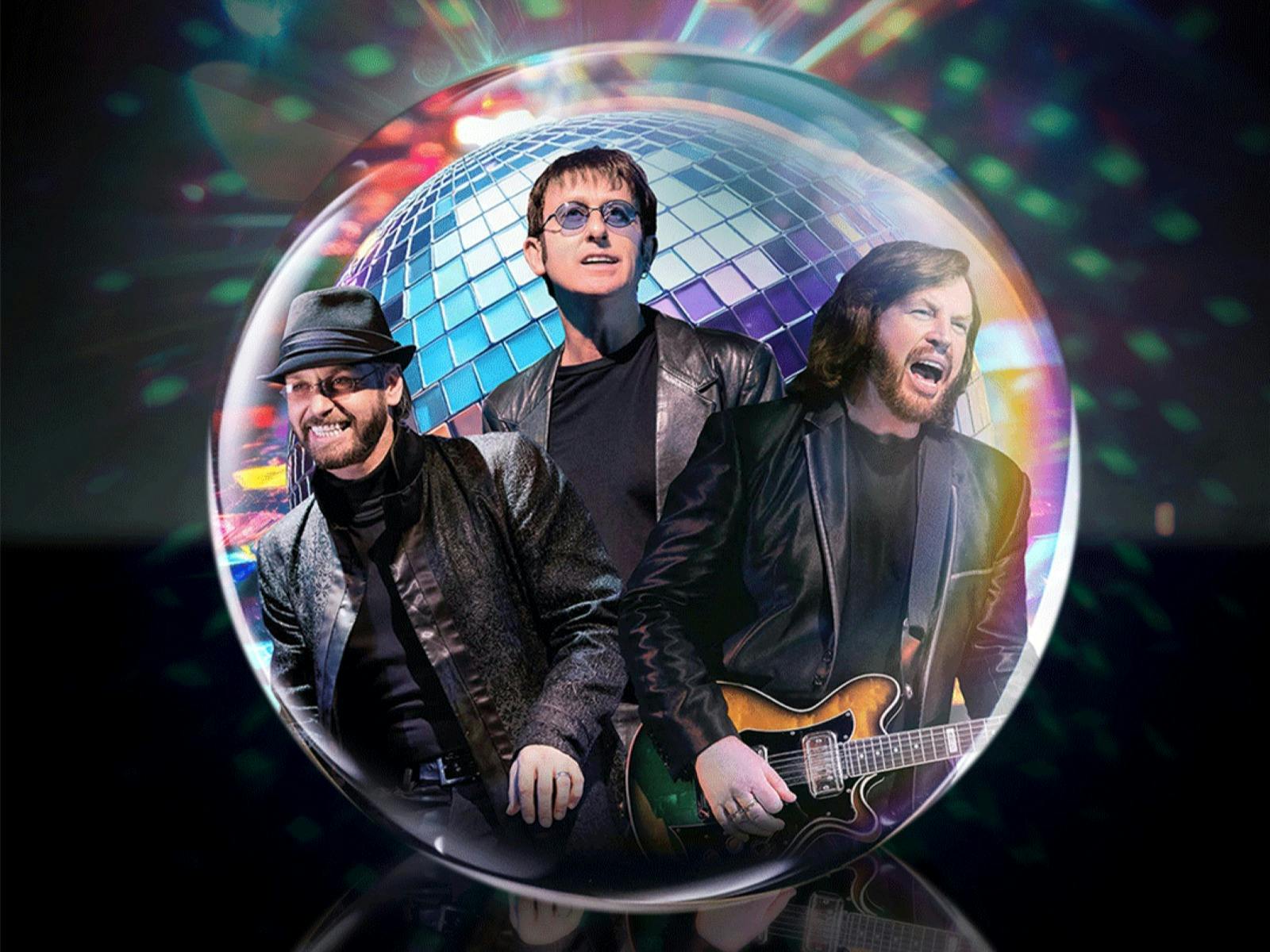 Three men performing inside a musical bubble