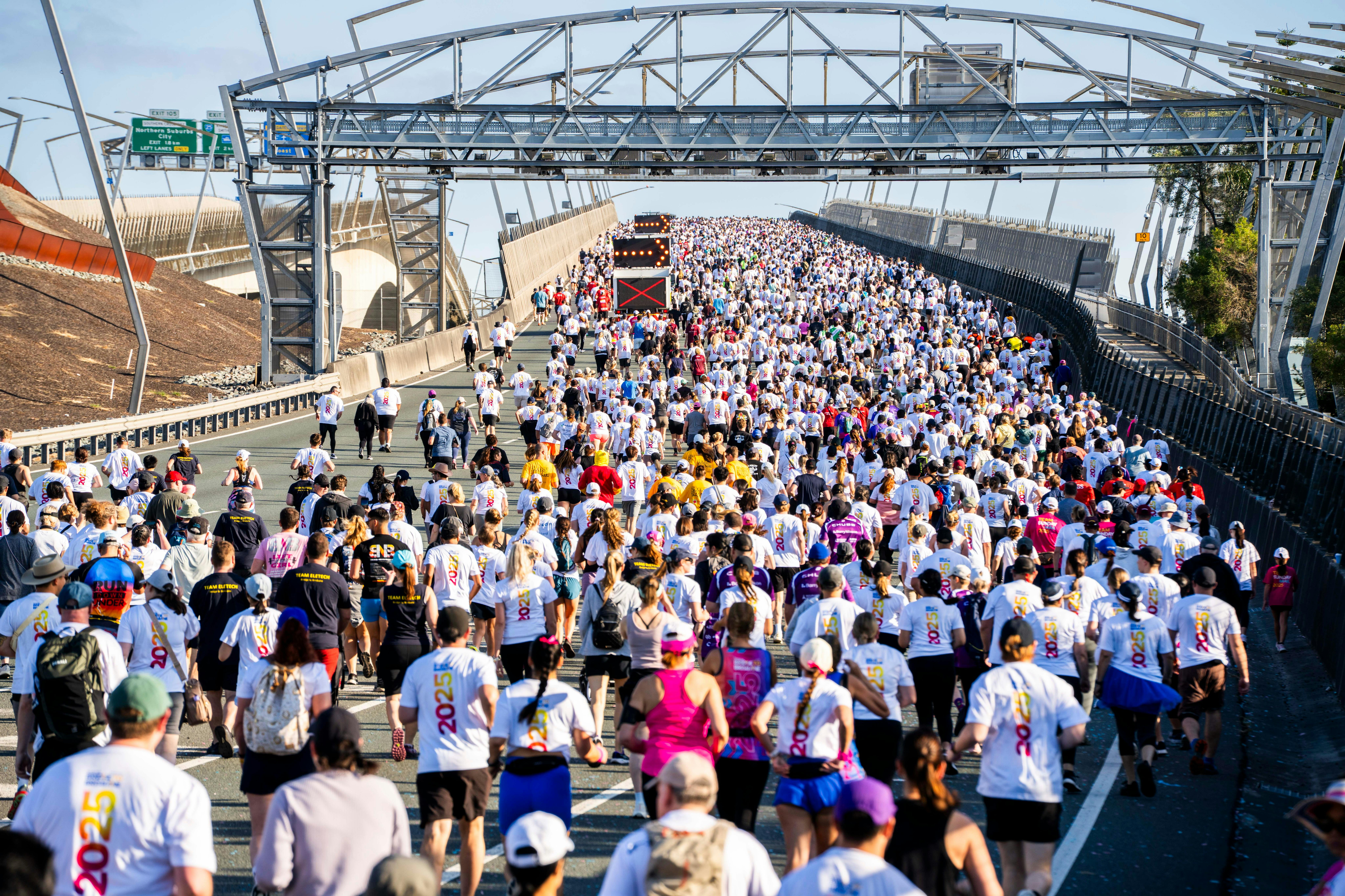 Runners heading up the Gateway Bridge.