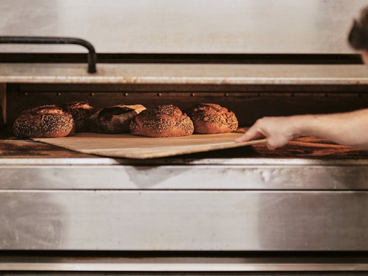 lagom bakery baking sourdough in the oven