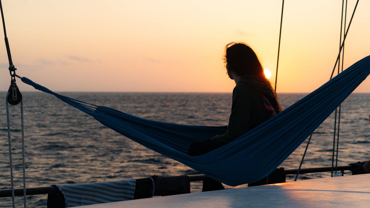Relax in a hammock as the sun melts into the sea, pure Summer Jo magic on the Great Barrier Reef!