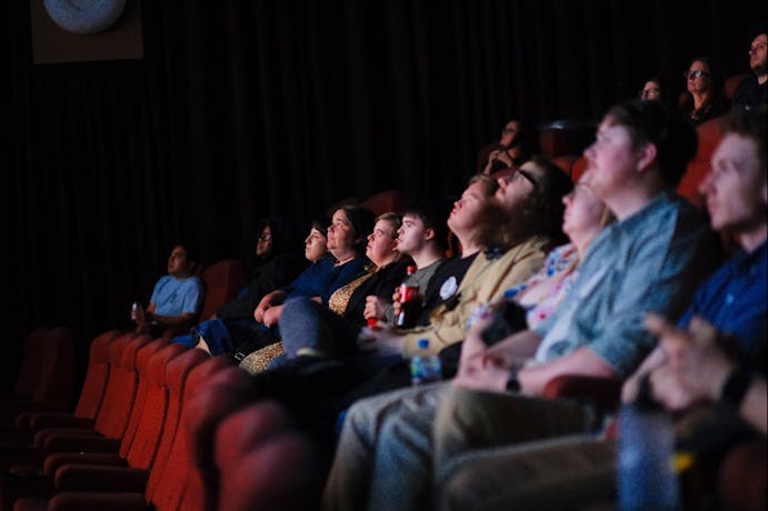 People in the cinema watching film