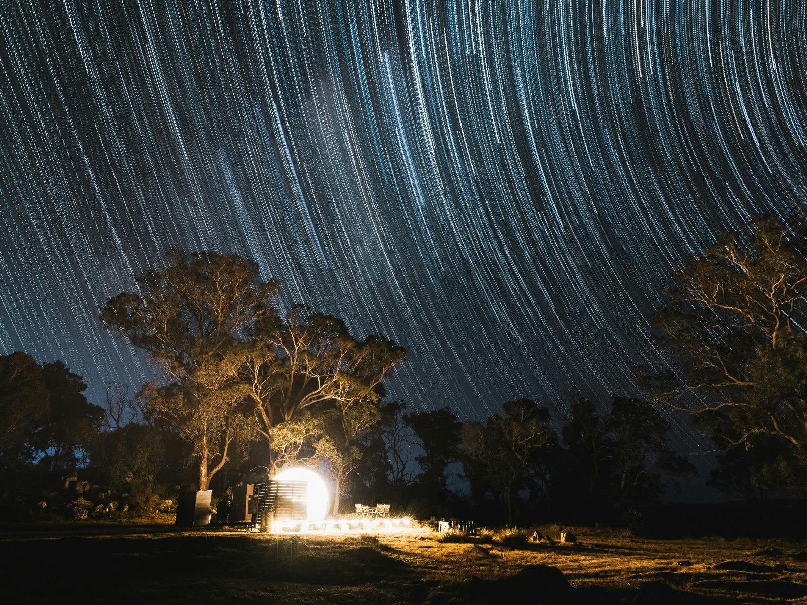 Time lapse star patterned sky above the Captain Thunderbolt Bubbletent at night