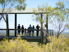 Group standing on a viewing platform at Litchfield National Park.
