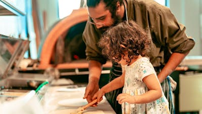 Teaching my little niece how to make pizza
