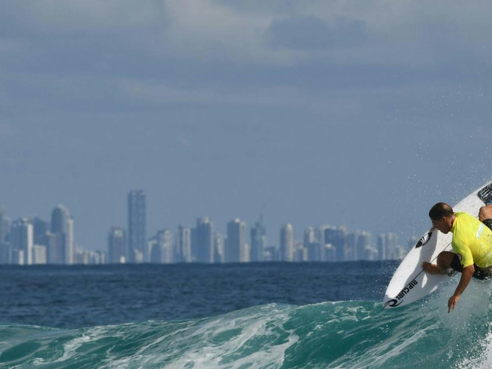 Surfer riding a wave, Gold Coast Surfer riding a wave, Gold Coast