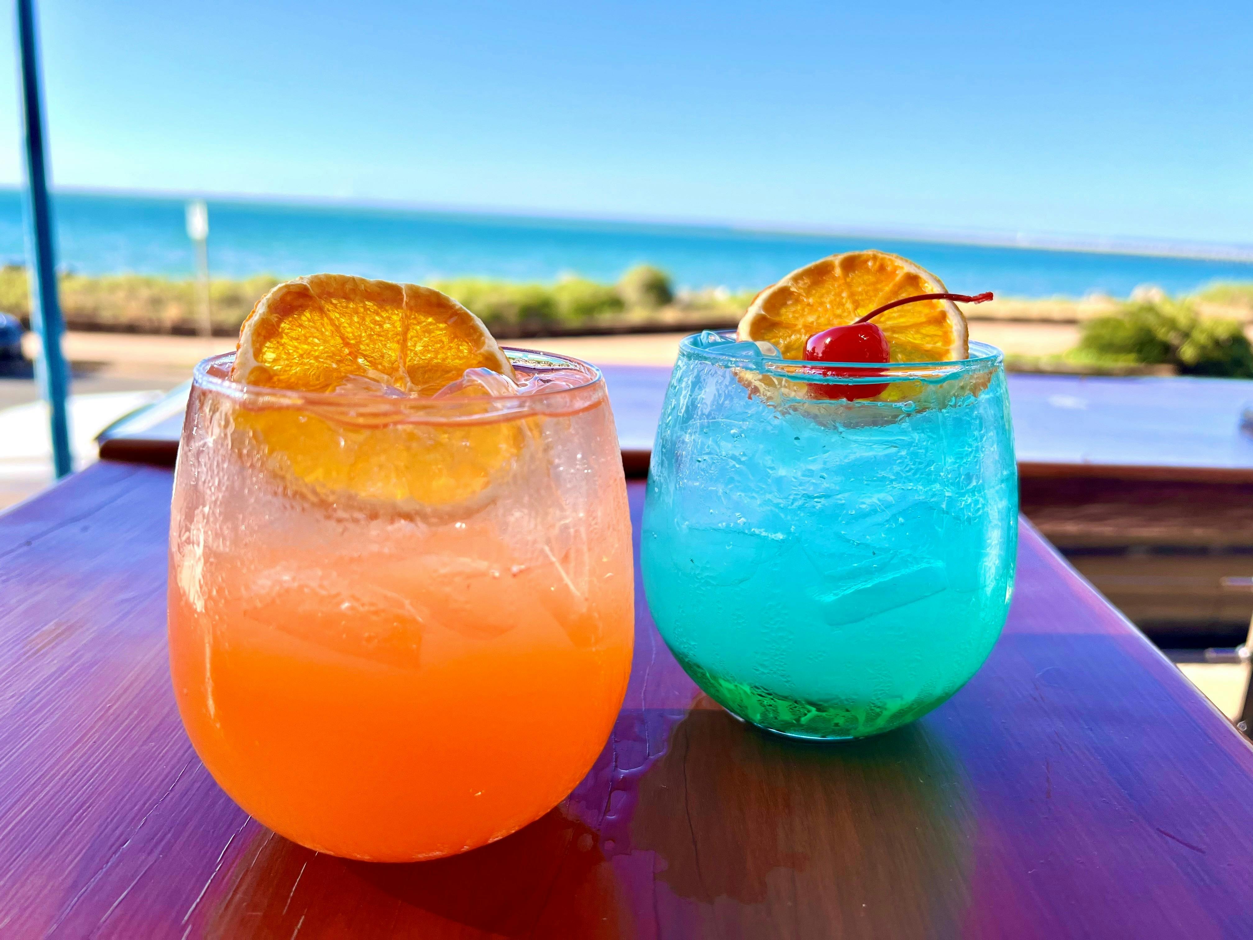 Enjoy a cocktail on the verandah overlooking the Bay