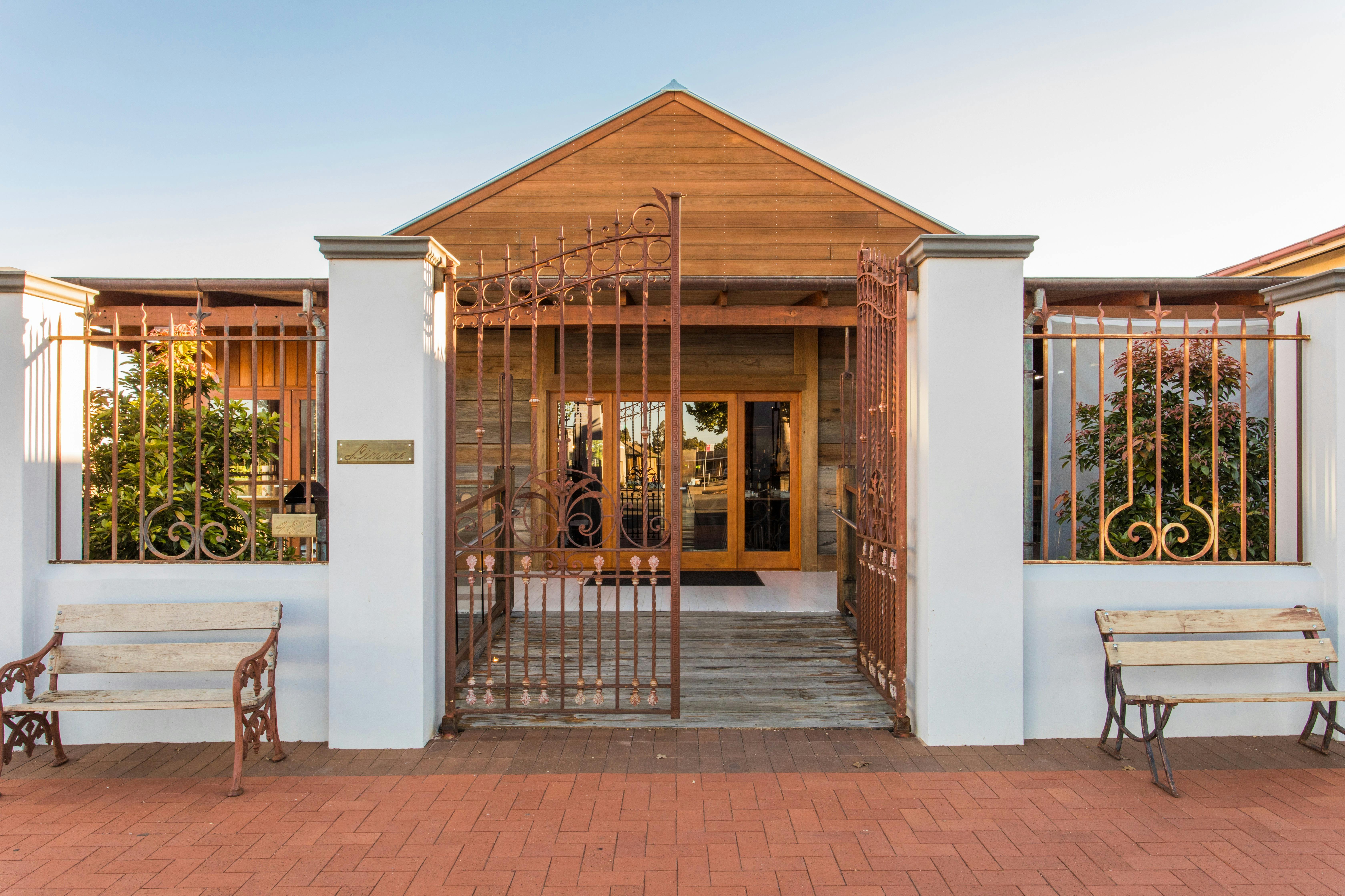 Front wrought iron gates, entrance to Limone Dining in Griffith