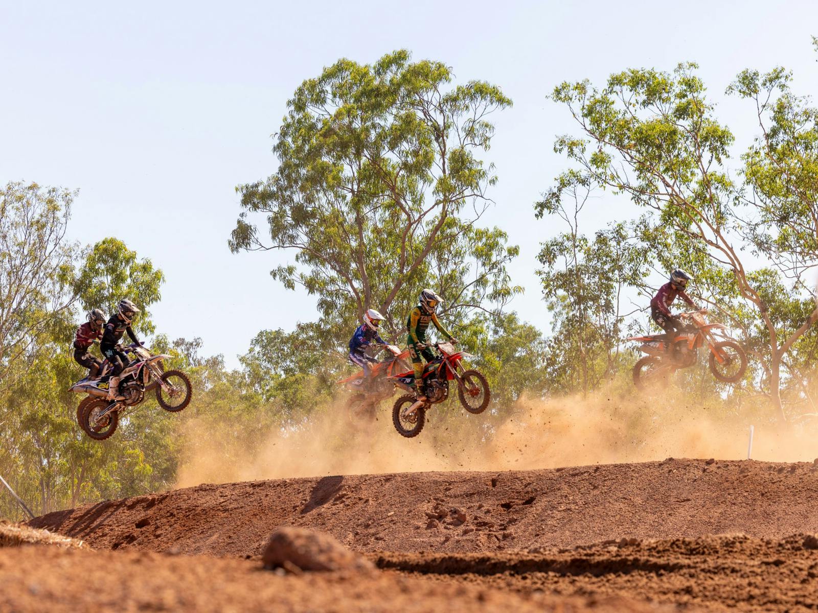 MXGP bikes jumping on track