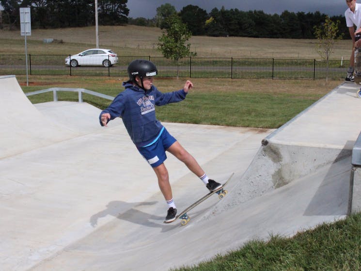 Boy on skate board at skate park