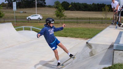 Boy on skate board at skate park