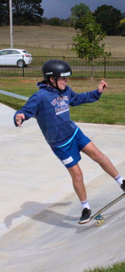 Boy on skate board at skate park