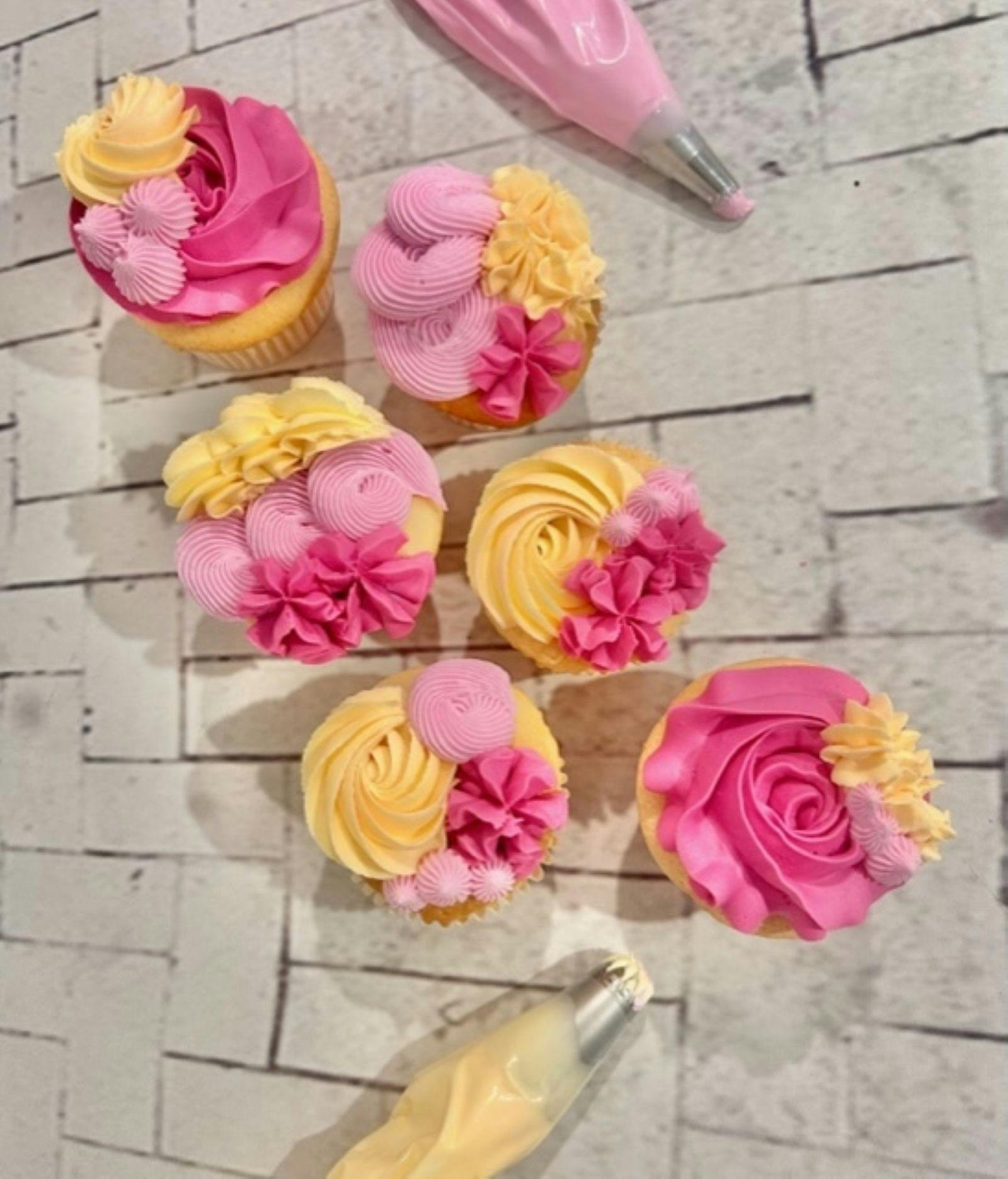 Cupcakes with pink and yellow piped buttercream