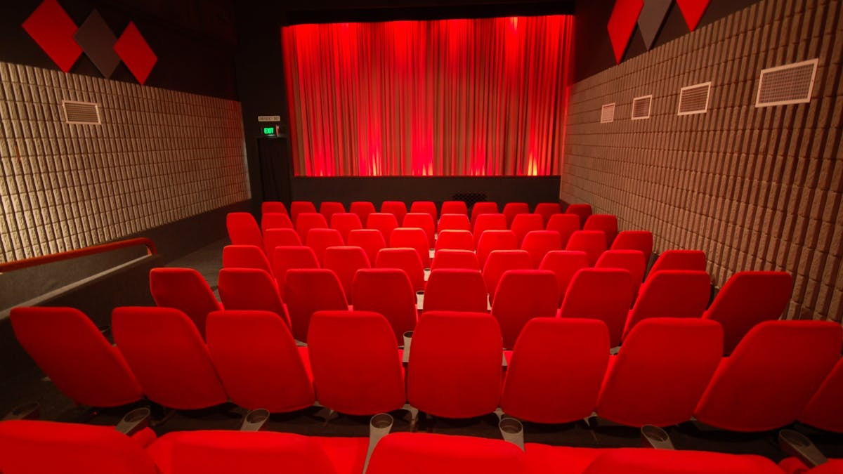 Inside view of the Bowen cinema furnished with red chairs