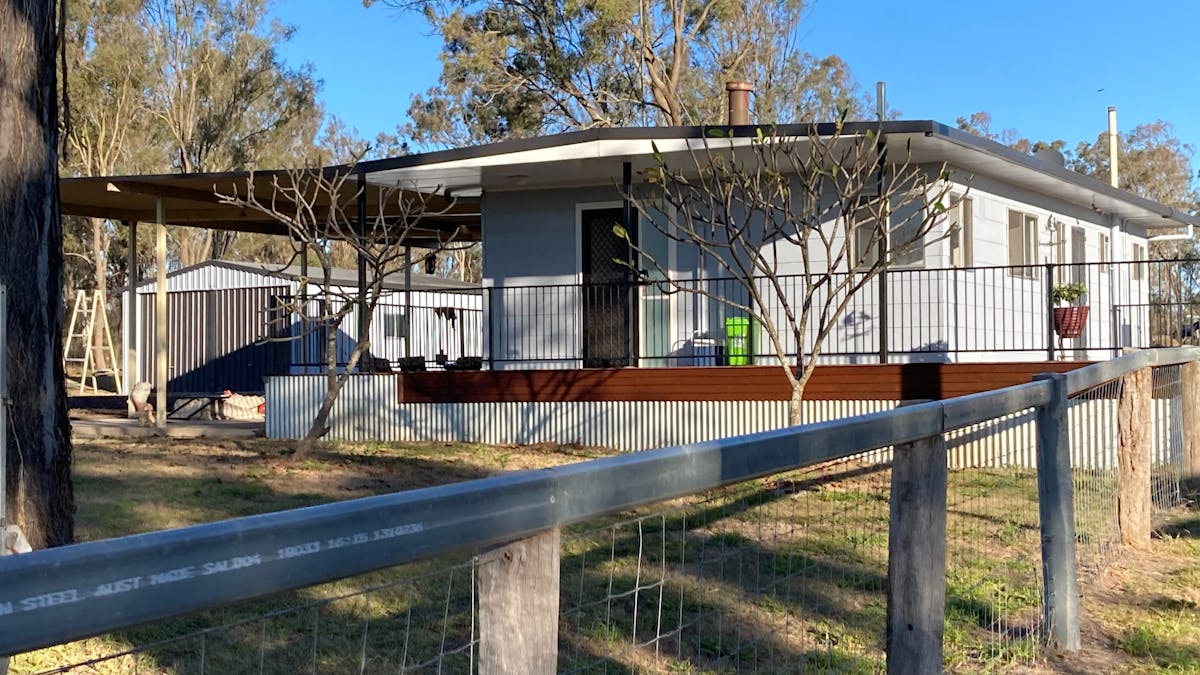 cottage front at boundary fence