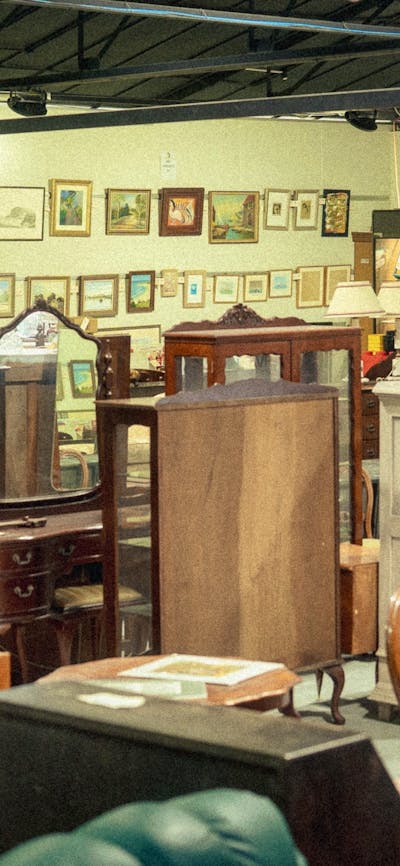 Shot of the inside of the EHVA showroom showing a selection of antique furniture and art