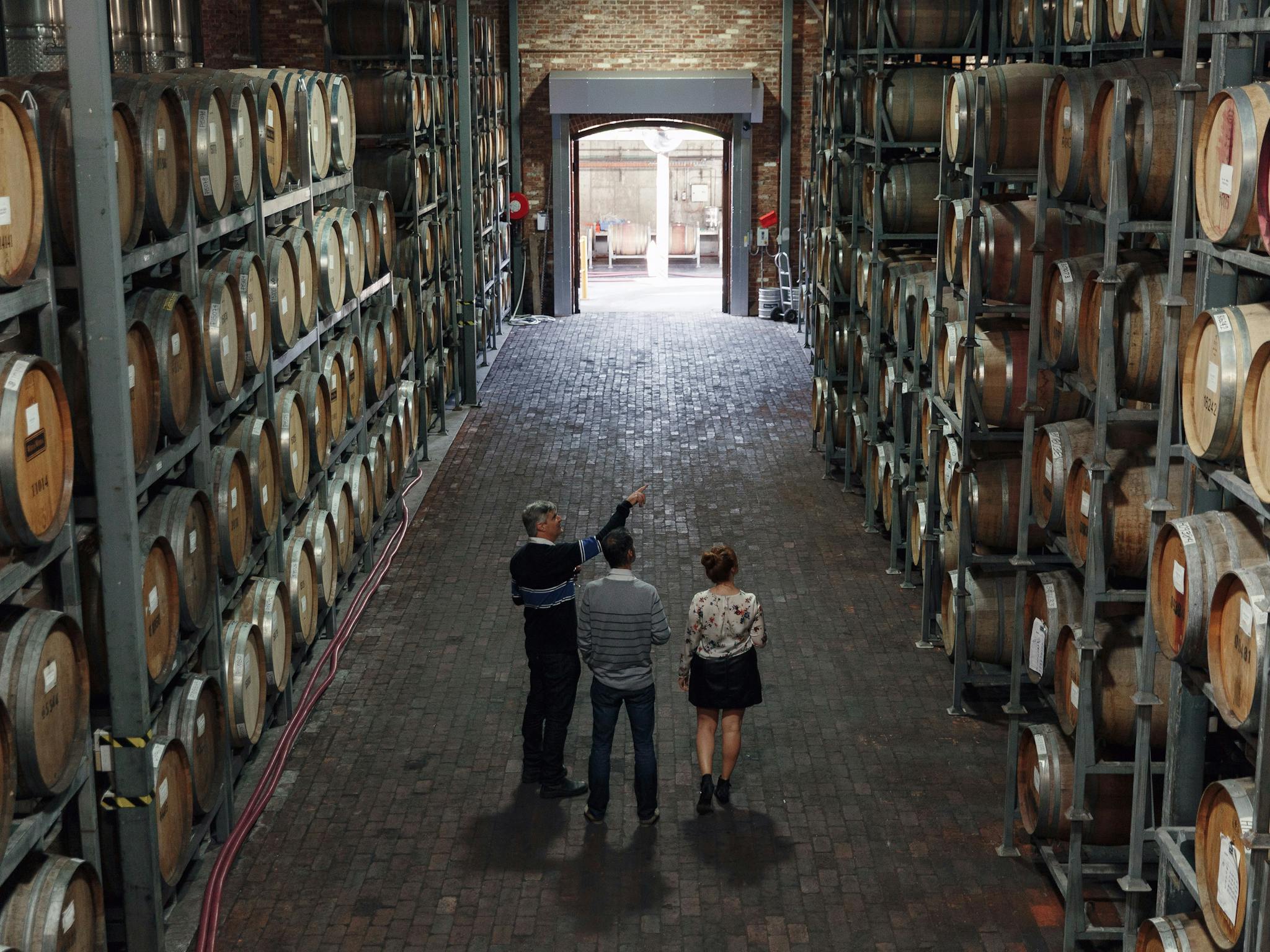 Guests admire the old barrel hall at Wirra Wirra