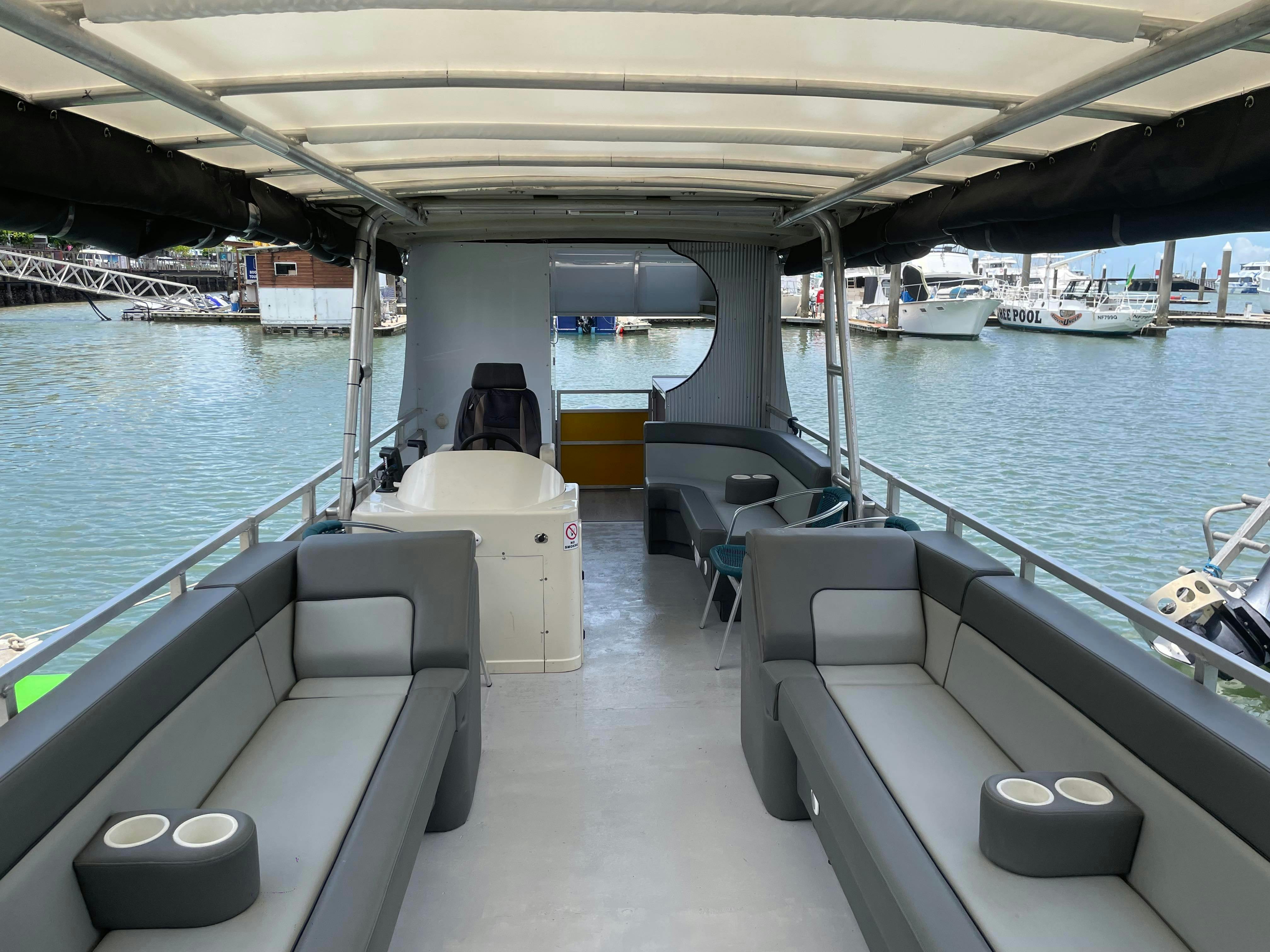 Wide shot of the inside of the Cairns River Sightseeing Cruise  Boat on the Trinity Inlet
